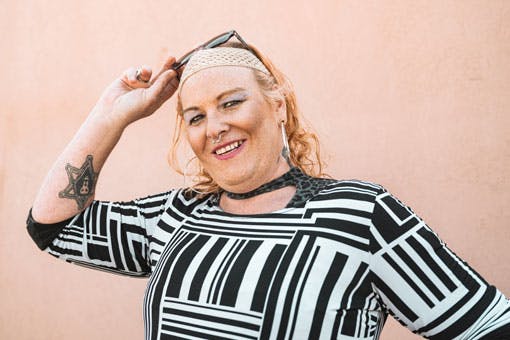 A person outside smiling