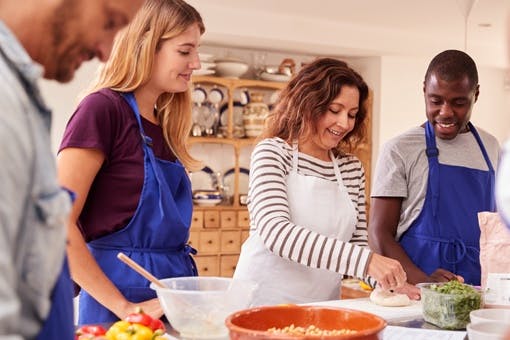 Group cooking together as part of the Dining with Diabetes program